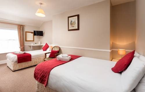 Imagen de la habitación del Hotel Iveagh Lodge. Foto 6