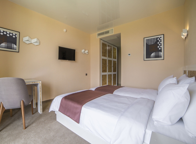 Imagen de la habitación del Hotel Iveria Inn Tbilisi. Foto 12