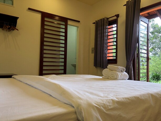 Imagen de la habitación del Hotel Ivory Falls Villa. Foto 16