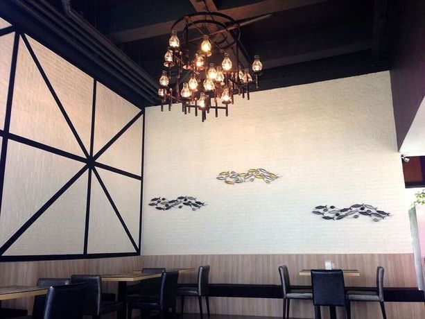 Imagen del bar/restaurante del Hotel Ivory Villa City. Foto 3