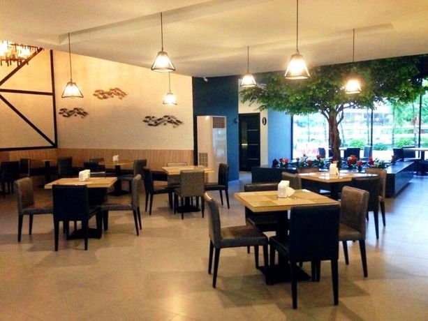 Imagen del bar/restaurante del Hotel Ivory Villa City. Foto 4