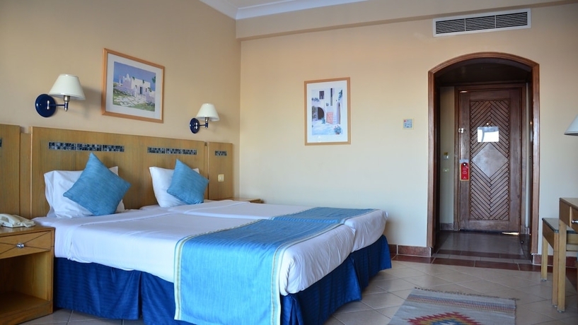 Imagen de la habitación del Hotel Ivy Cyrene Island Aqua Park Resort. Foto 7