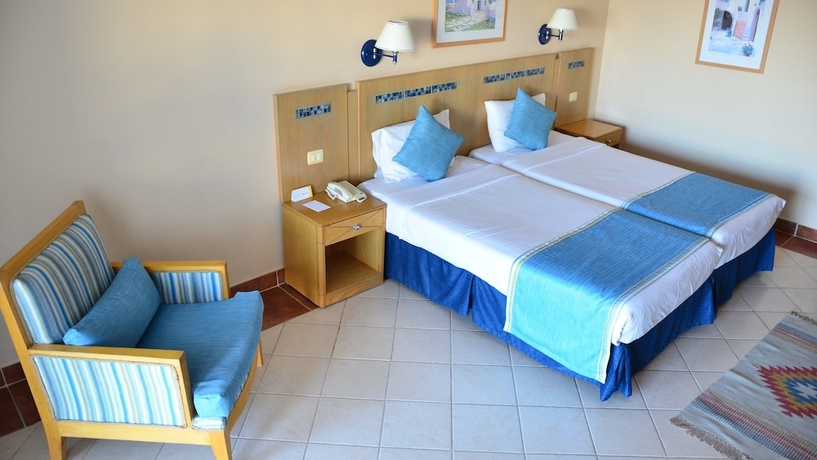 Imagen de la habitación del Hotel Ivy Cyrene Island Aqua Park Resort. Foto 11