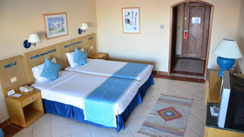 Imagen de la habitación del Hotel Ivy Cyrene Island Resort. Foto 9