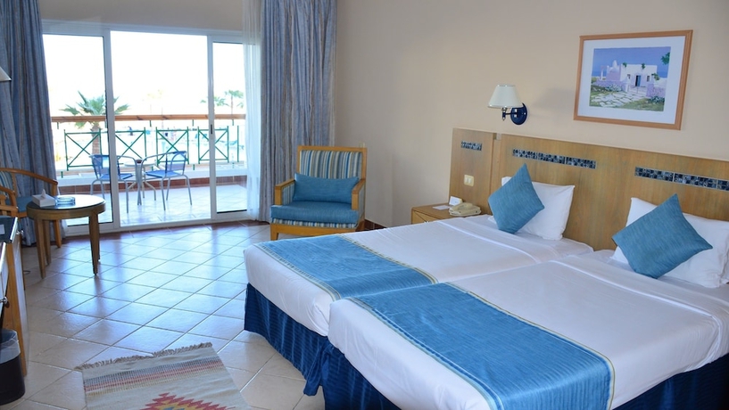 Imagen de la habitación del Hotel Ivy Cyrene Island Resort. Foto 10