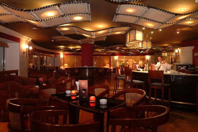 Imagen del bar/restaurante del Hotel Ivy Cyrene Sharm Resort. Foto 8