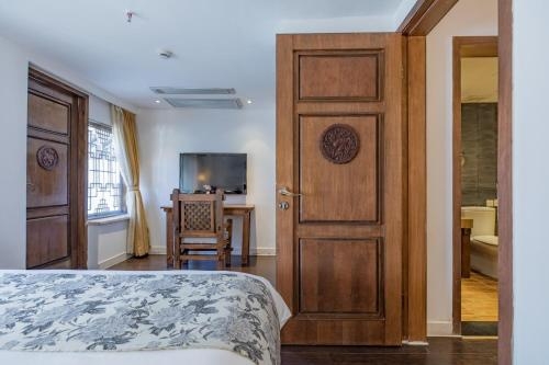 Imagen de la habitación del Hotel Ivy Garden Hotels and Resorts - Lijiang Henghehao. Foto 6