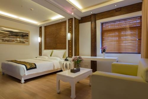 Imagen de la habitación del Hotel Ivy Garden Hotels and Resorts - Lijiang Henghehao. Foto 8