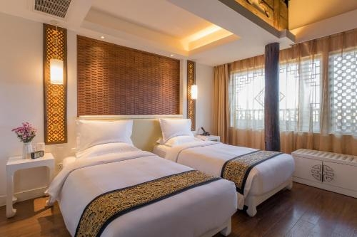 Imagen de la habitación del Hotel Ivy Garden Hotels and Resorts - Lijiang Henghehao. Foto 9