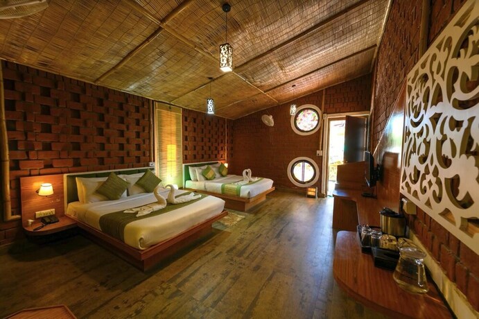 Imagen de la habitación del Hotel Ivy Green Resort. Foto 15