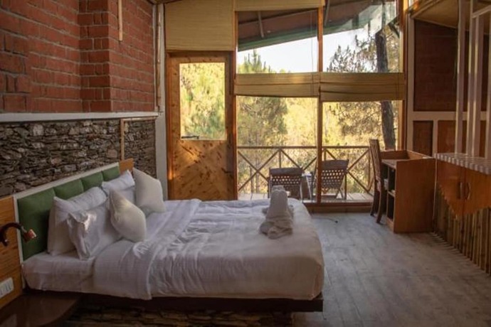 Imagen de la habitación del Hotel Ivy Green Resort. Foto 17