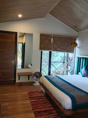 Imagen de la habitación del Hotel Ivy Green Resort. Foto 18