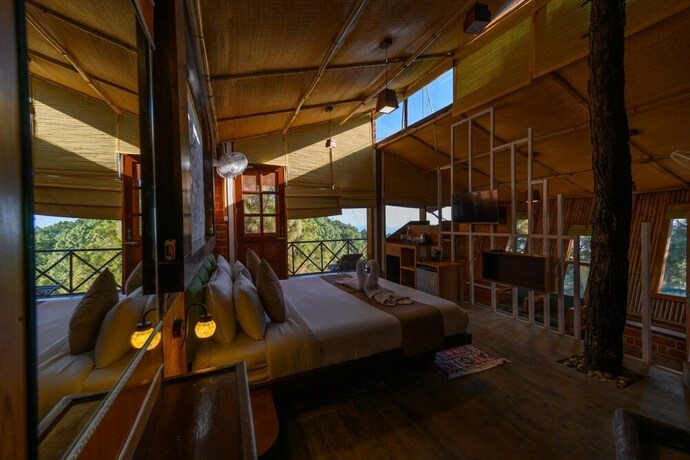 Imagen de la habitación del Hotel Ivy Green Resort. Foto 19