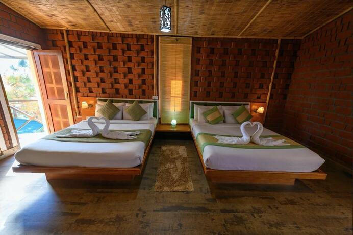 Imagen de la habitación del Hotel Ivy Green Resort. Foto 23