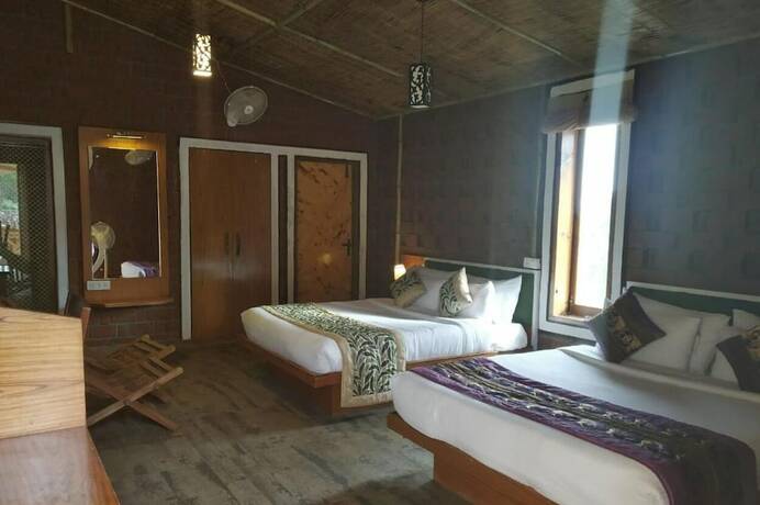 Imagen de la habitación del Hotel Ivy Green Resort. Foto 26