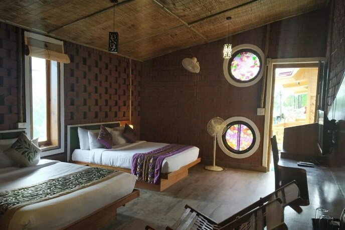 Imagen de la habitación del Hotel Ivy Green Resort. Foto 29