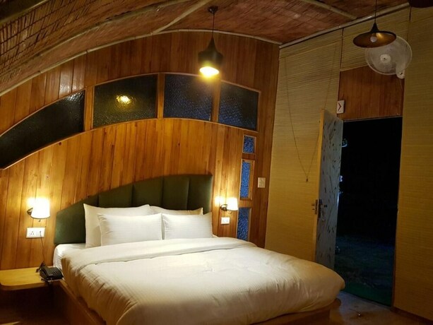 Imagen de la habitación del Hotel Ivy Green Resort. Foto 32