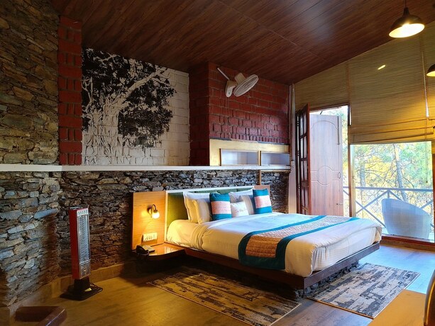 Imagen de la habitación del Hotel Ivy Green Resort. Foto 34