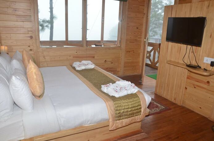 Imagen de la habitación del Hotel Ivy Green Resort. Foto 37