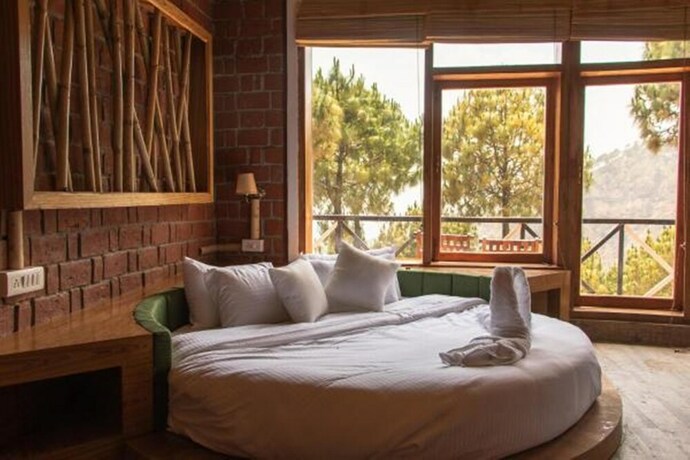 Imagen de la habitación del Hotel Ivy Green Resort. Foto 39