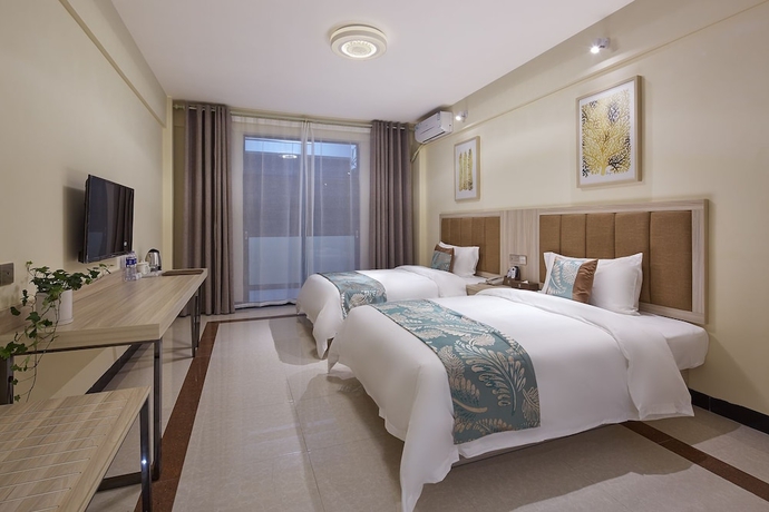 Imagen de la habitación del Hotel Ivy International Apartment. Foto 2