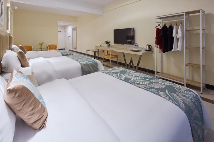 Imagen de la habitación del Hotel Ivy International Apartment. Foto 11