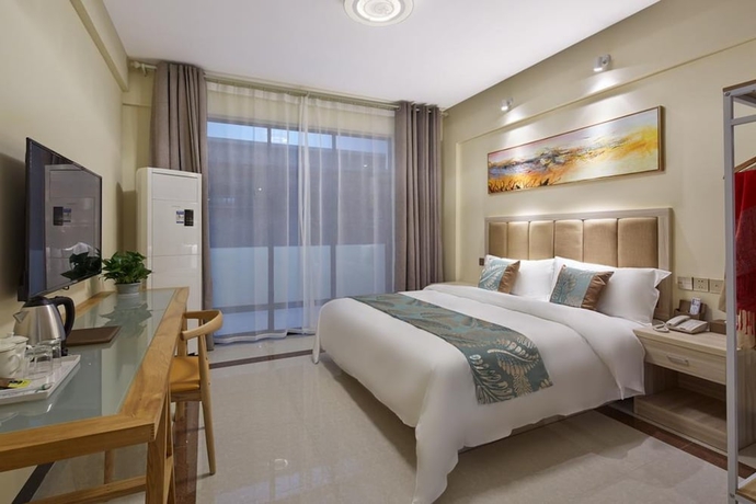 Imagen de la habitación del Hotel Ivy International Apartment. Foto 13