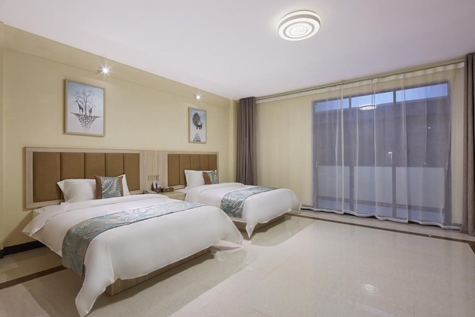 Imagen de la habitación del Hotel Ivy International Apartment. Foto 15