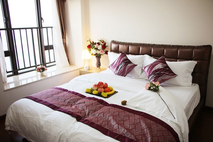 Imagen de la habitación del Hotel Iway Aparment Pazhou Branch. Foto 10