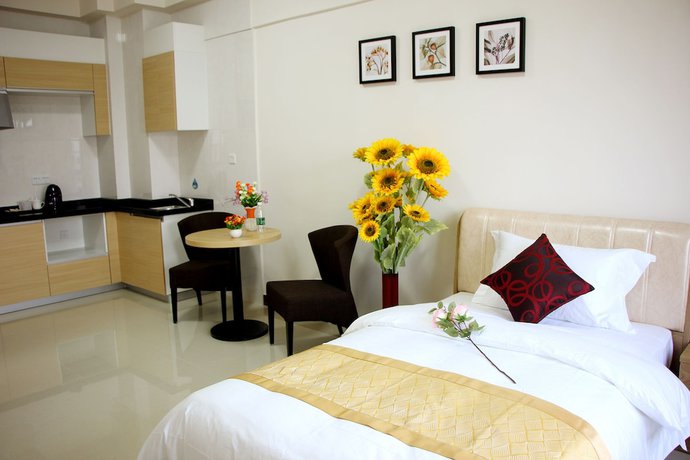 Imagen de la habitación del Hotel Iway Aparment Pazhou Branch. Foto 15
