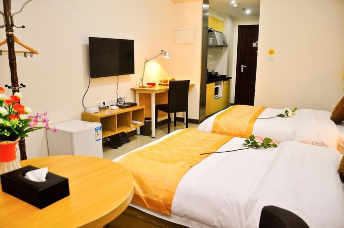 Imagen de la habitación del Hotel Iway Aparment Pazhou Branch. Foto 19