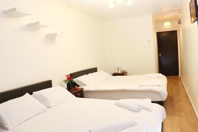 Imagen de la habitación del Hotel Iway Inn. Foto 10