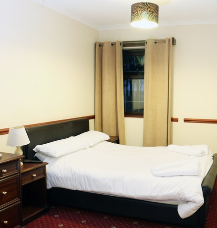 Imagen de la habitación del Hotel Iway Inn. Foto 11