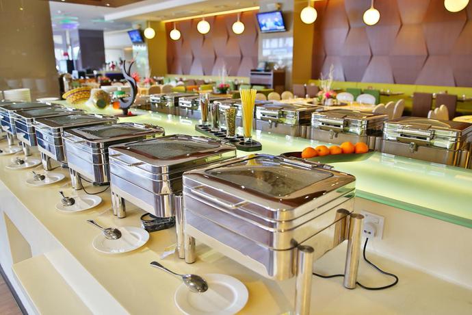 Imagen del bar/restaurante del Hotel Ixora. Foto 1