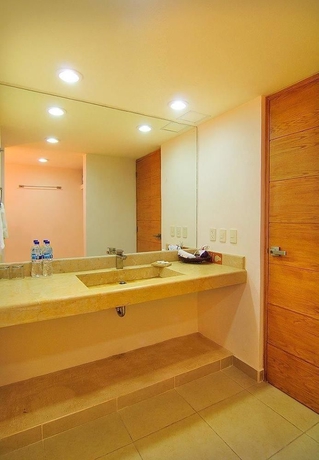 Imagen de la habitación del Hotel Ixzi Plus and Villas. Foto 4