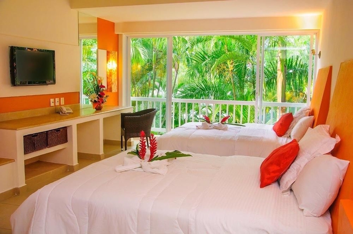 Imagen de la habitación del Hotel Ixzi Plus and Villas. Foto 5