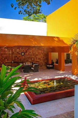 Imagen de los interiores del Hotel Ixzi Plus and Villas. Foto 14