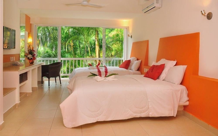 Imagen de la habitación del Hotel Ixzi Plus and Villas. Foto 8