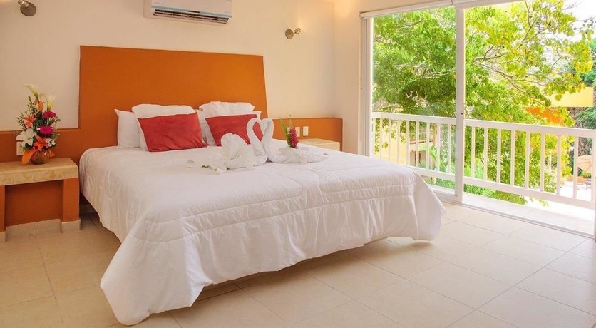 Imagen de la habitación del Hotel Ixzi Plus and Villas. Foto 9