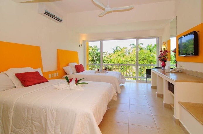 Imagen de la habitación del Hotel Ixzi Plus and Villas. Foto 10
