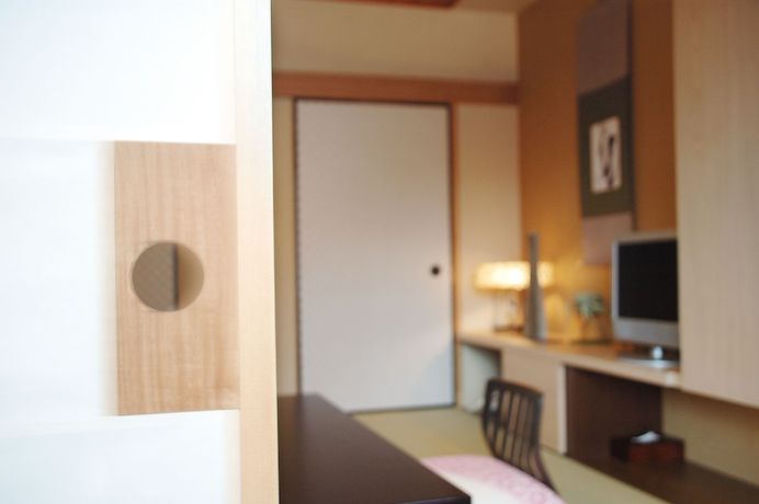Imagen de la habitación del Hotel Iyaonsen. Foto 3