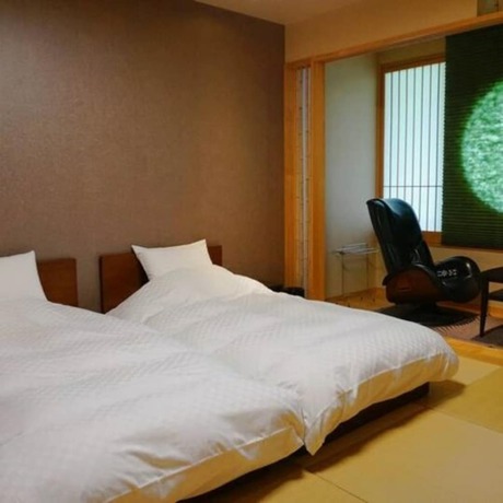 Imagen de la habitación del Hotel Iyaonsen. Foto 4