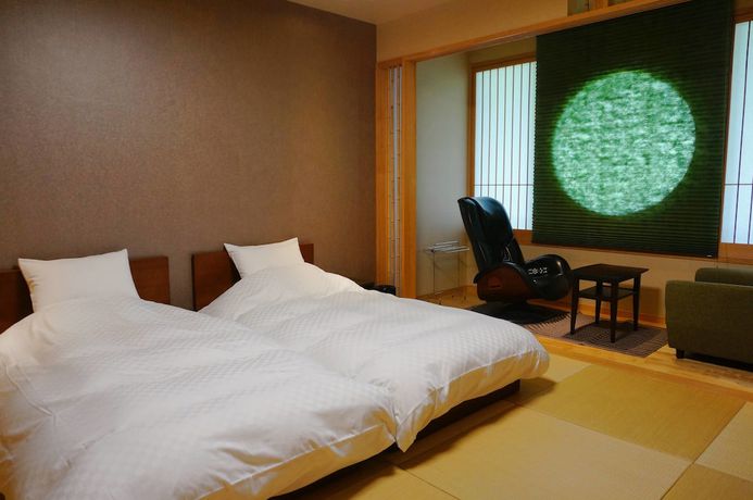 Imagen de la habitación del Hotel Iyaonsen. Foto 5