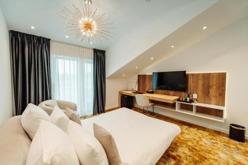 Imagen de la habitación del Hotel Iza. Foto 15