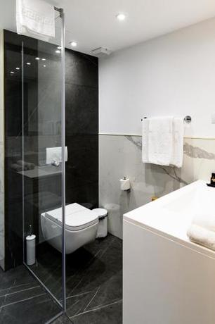 Imagen de la habitación del Hotel Iza. Foto 19