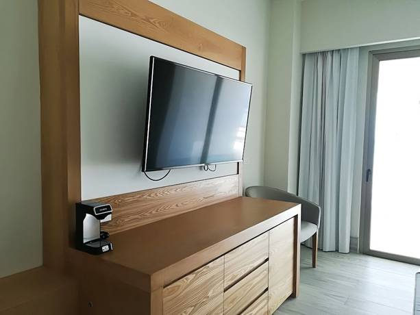 Imagen de la habitación del Hotel Izla Beach Front. Foto 3