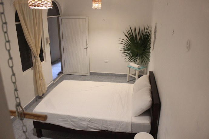 Imagen de la habitación del Hotel Izsla Suites. Foto 6