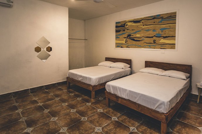 Imagen de la habitación del Hotel Izsla Suites. Foto 10