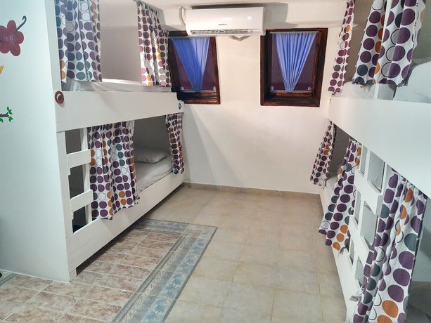 Imagen de la habitación del Hotel Izsla Suites. Foto 18