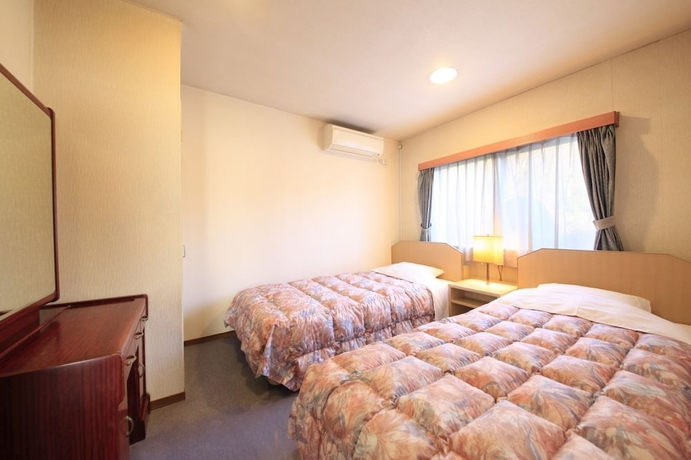 Imagen de la habitación del Hotel Izu Ippekiko Lakeside Terrace. Foto 7